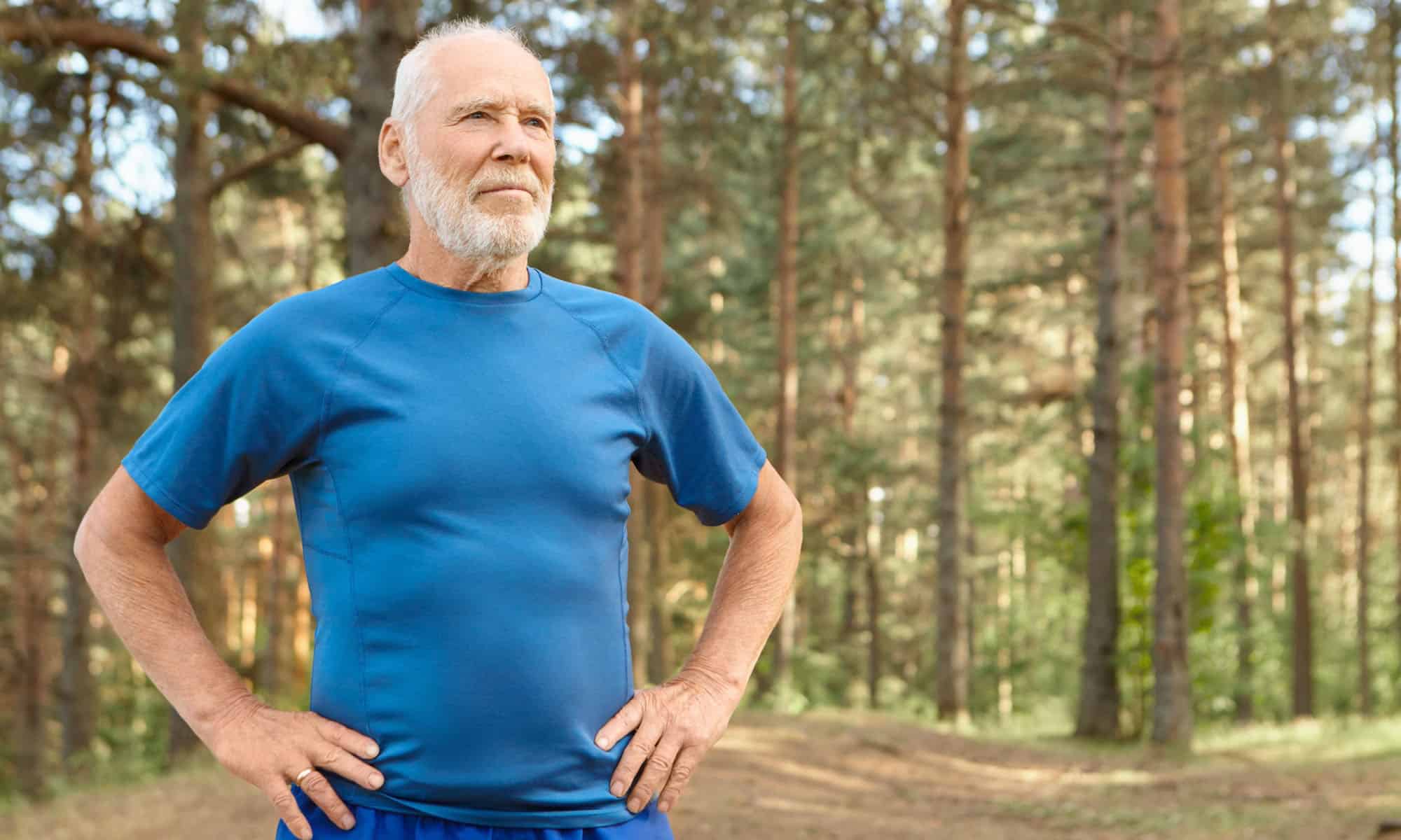 elderly man determined to overcome heartburn.