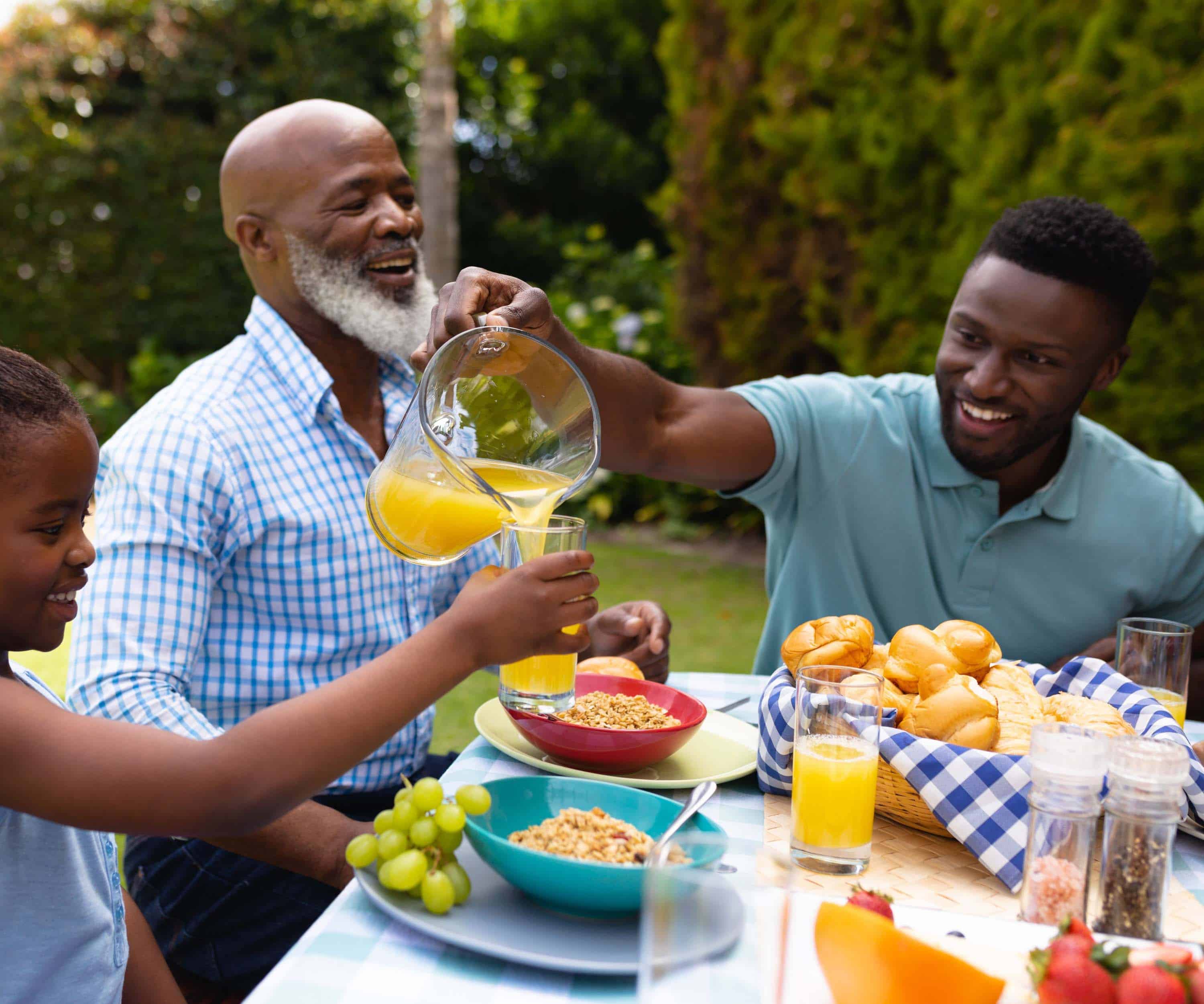 loving family preparing outdoor dinner.