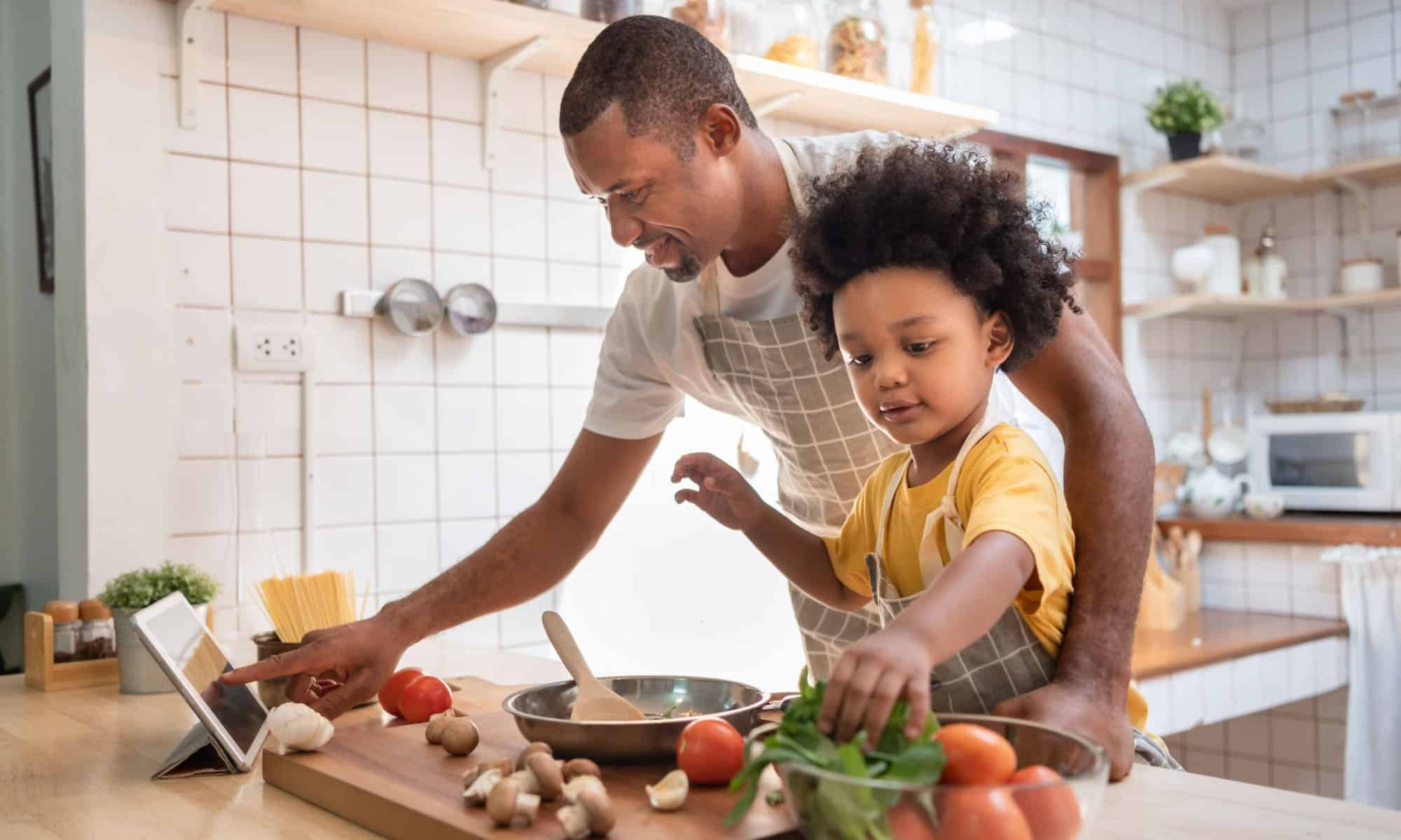 son and father following a mediterranean diet meal plan.